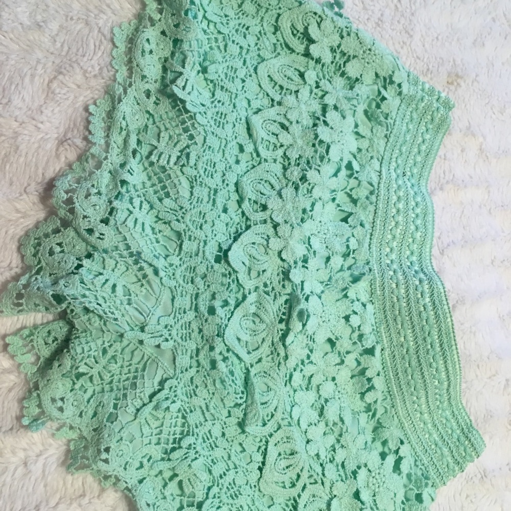Mint green shorts. Worn little size 7/9